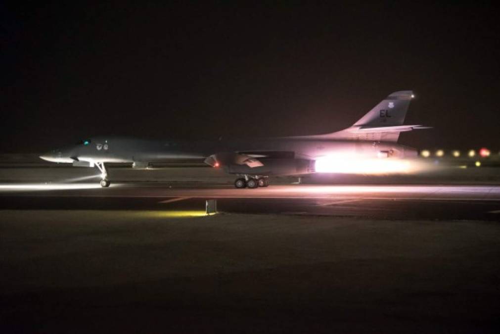 In this image released by the US Air Force, a 34th Expeditionary Bomb Squadron B-1B Lancer aircraft assigned to the 379th Air Expeditionary Wing departs from Al Udeid Air Base, Qatar, April 14, 2018. <br/>US President Donald Trump triumphantly declared 'Mission Accomplished!' on Saturday following a US-led missile assault on the Syrian regime and warned another attack could follow if Damascus were to unleash more chemical weapons. / AFP PHOTO / US AIR FORCE / Phil Speck / RESTRICTED TO EDITORIAL USE - MANDATORY CREDIT 'AFP PHOTO / US Air National Guard / Master Sgt. Phil Speck' - NO MARKETING NO ADVERTISING CAMPAIGNS - DISTRIBUTED AS A SERVICE TO CLIENTS<br/><br/>