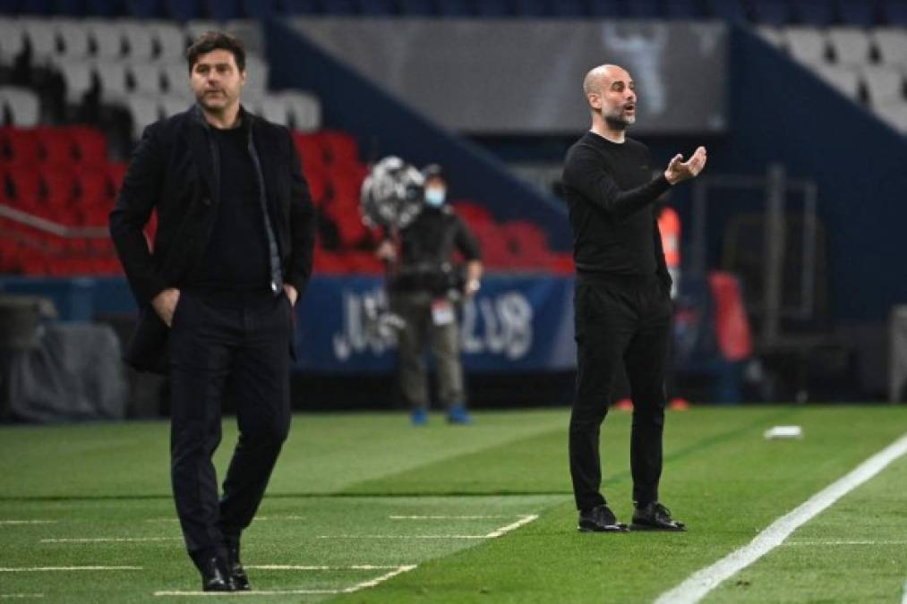 Mauricio Pochettino y Pep Guardiola, durante el partido en el Parque de los Príncipes.