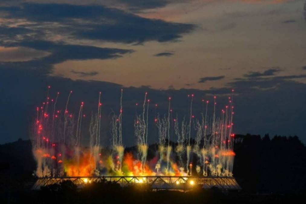 A fireworks display is triggered over the Olympic stadium on June 11, 2021 in Rome as part of the UEFA Euro 2020 2021 European Football Championship's opening ceremony, prior to the competition's kick off Turkey vs Italy. (Photo by Tiziana FABI / AFP)