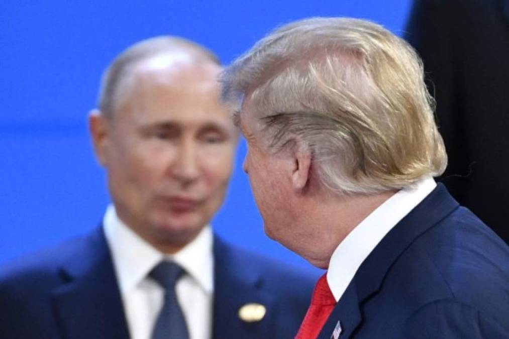 El gesto de Putin cuando Trump buscaba su lugar para la foto.