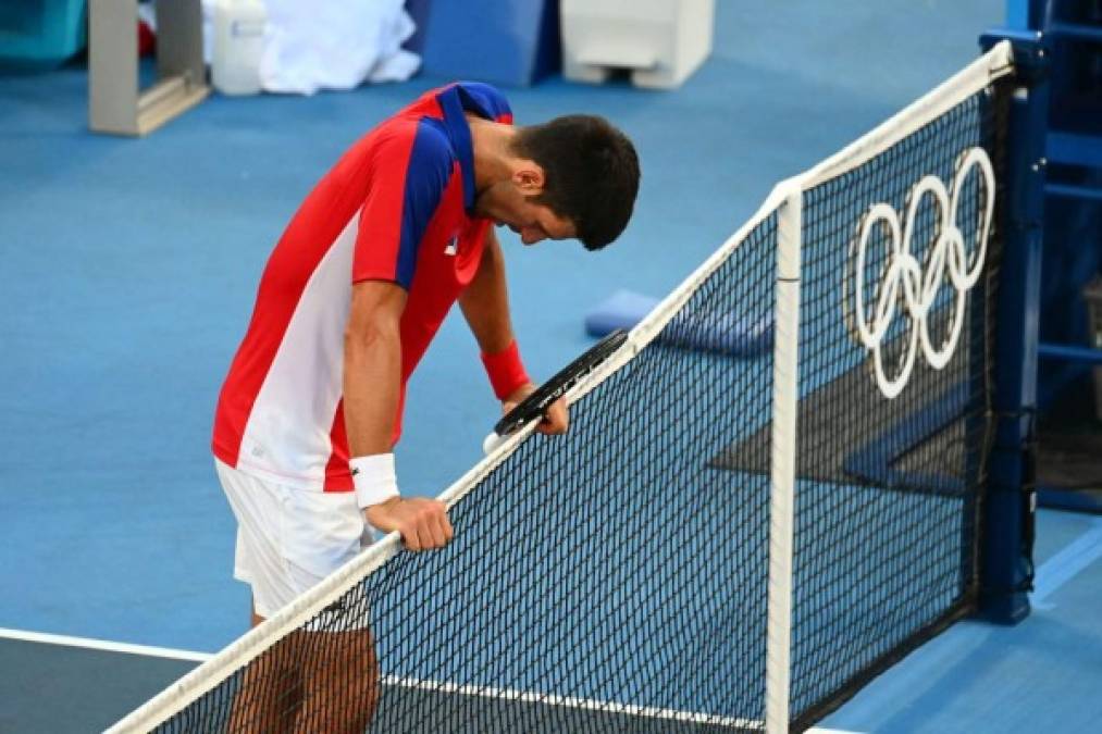 Djokovic, cabizbajo después de perder el bronce contra Pablo Carreño.