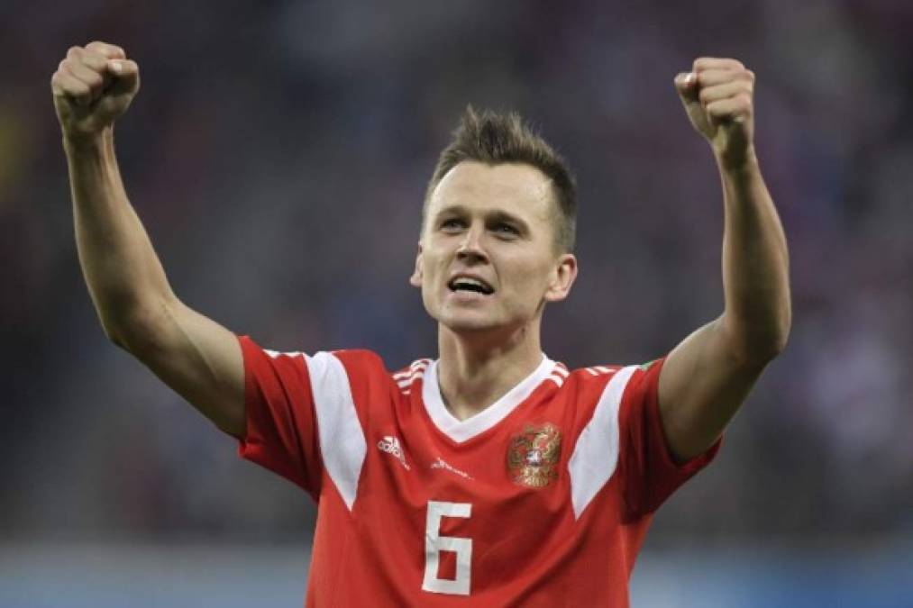 Russia's midfielder Denis Cheryshev celebrates scoring the 2-0 goal during the Russia 2018 World Cup Group A football match between Russia and Egypt at the Saint Petersburg Stadium in Saint Petersburg on June 19, 2018. / AFP PHOTO / GABRIEL BOUYS / RESTRICTED TO EDITORIAL USE - NO MOBILE PUSH ALERTS/DOWNLOADS
