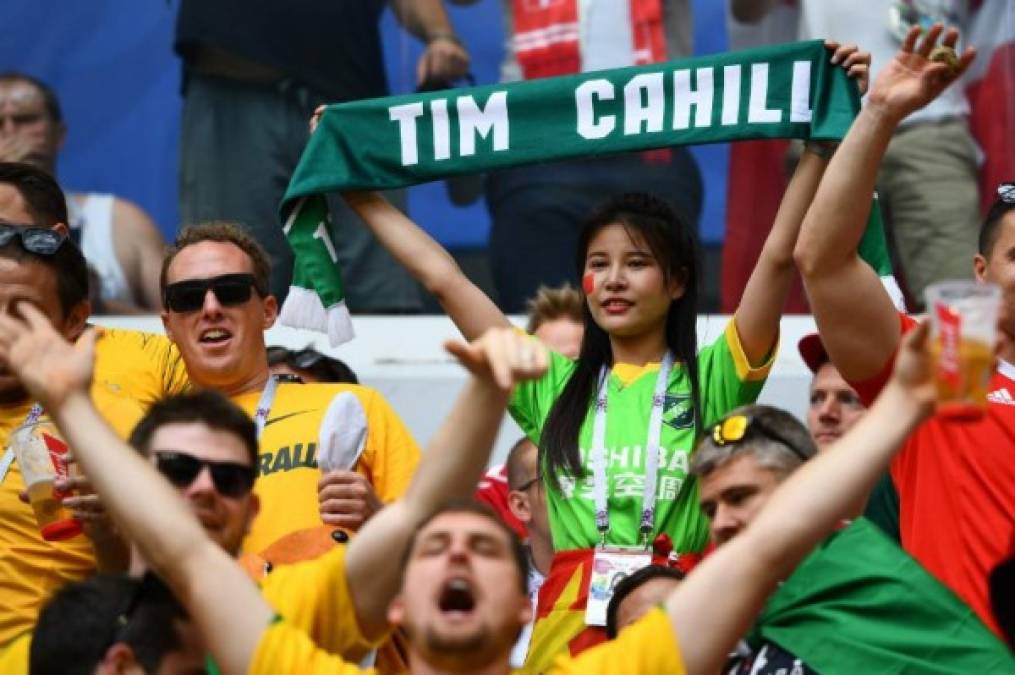 An Australia fan holds up a scarf in the crowd during the Russia 2018 World Cup Group C football match between Denmark and Australia at the Samara Arena in Samara on June 21, 2018. / AFP PHOTO / MANAN VATSYAYANA / RESTRICTED TO EDITORIAL USE - NO MOBILE PUSH ALERTS/DOWNLOADS