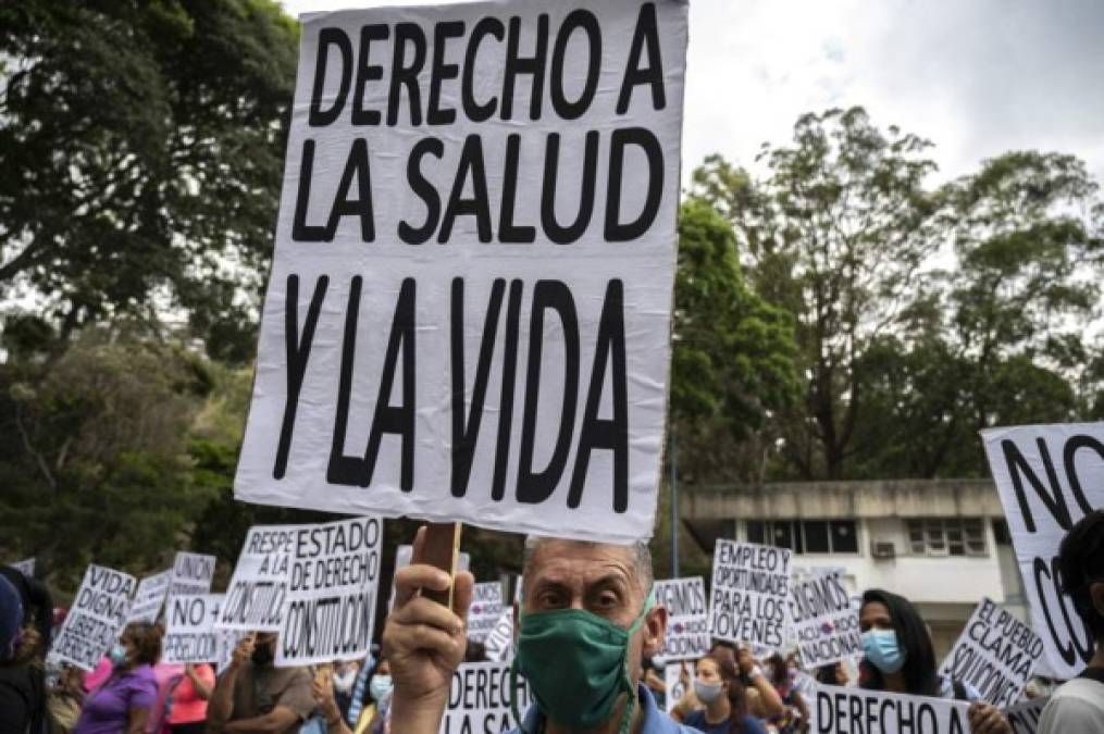 VENEZUELA: Trabajadores de distintos gremios en Venezuela exigieron salarios 'dignos' y vacunación masiva contra la covid-19 en medio de la 'crisis humanitaria' y la pandemia.<br/><br/>En varios estados decenas de trabajadores, acompañados de organizaciones civiles y políticos opositores, se concentraron para manifestar su rechazo a las condiciones laborales actuales, cuando en Venezuela el salario mínimo es de 0,63 centavos de dólar, según la tasa oficial.