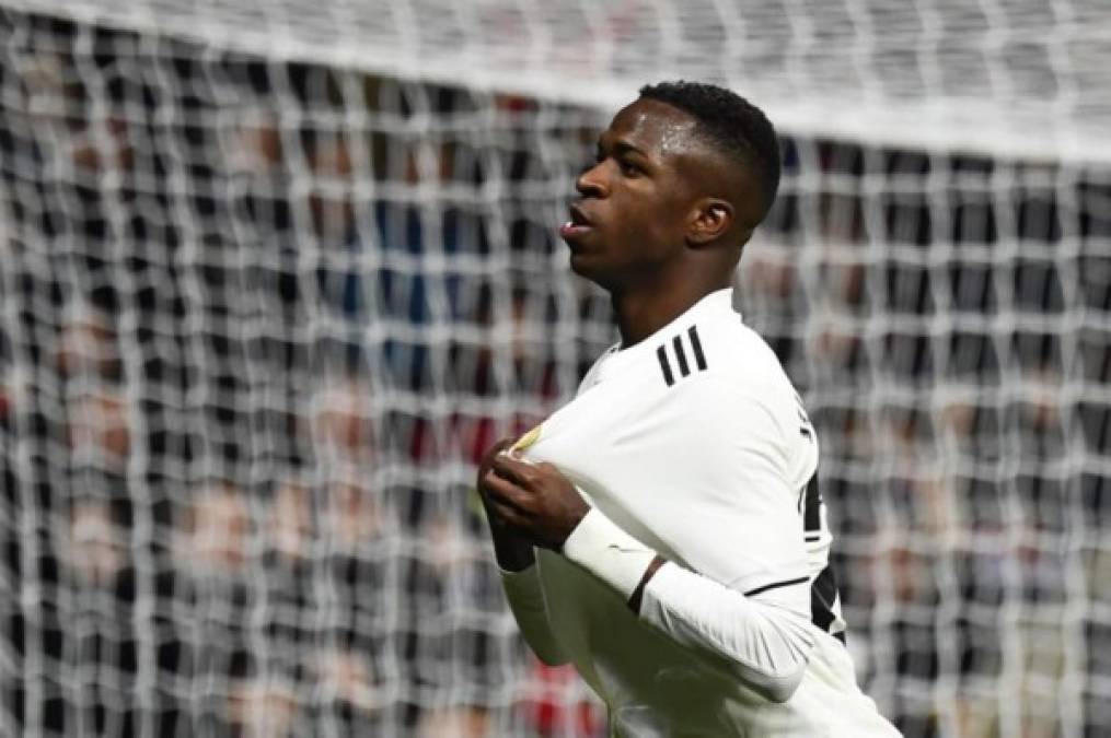 Real Madrid's Brazilian forward Vinicius Junior celebrates his goal during the Spanish league football match Real Madrid CF against Club Deportivo Alaves at the Santiago Bernabeu stadium in Madrid on February 3, 2019. (Photo by GABRIEL BOUYS / AFP)