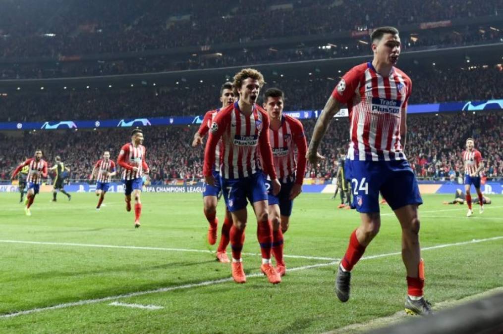 La celebración de los jugadores del Atlético de Madrid tras el gol de José María Giménez.