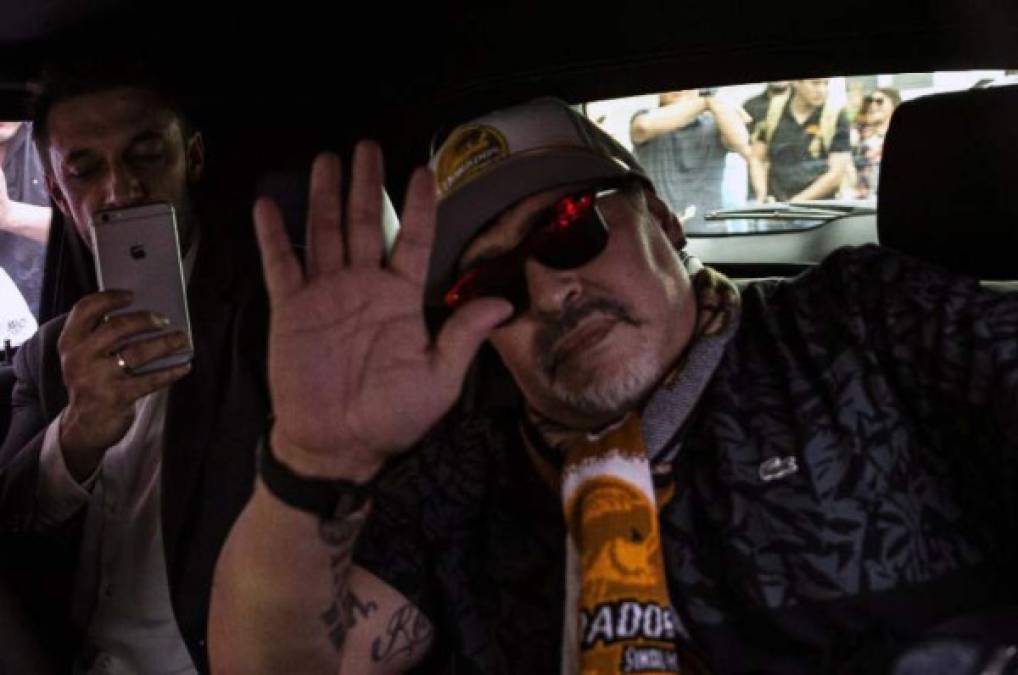 Argentine legend Diego Maradona cheers at fans during his first training session as coach of Mexican football club Dorados, at the Banorte stadium in Culiacan, Sinaloa State, Mexico, on September 10, 2018.<br/>As much as he was a genius with the ball at his feet, Diego Maradona's coaching career has been far from distinguished and took a curious turn when he joined Mexican second-division outfit Dorados. / AFP PHOTO / Pedro PARDO