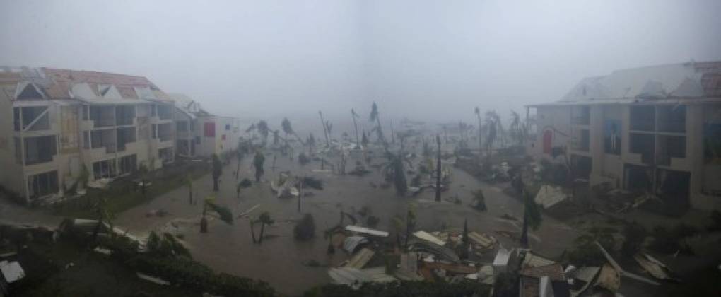 A panoramic photo taken on September 6, 2017 shows the Hotel Mercure in Marigot, near the Bay of Nettle, on the French Collectivity of Saint Martin, during the passage of Hurricane Irma.<br/>France, the Netherlands and Britain on September 7 sent water, emergency rations and rescue teams to their stricken territories in the Caribbean hit by Hurricane Irma, which has killed at least 10 people. The worst-affected island so far is Saint Martin, which is divided between the Netherlands and France, where eight of the 10 confirmed deaths took place.<br/> / AFP PHOTO / Lionel CHAMOISEAU
