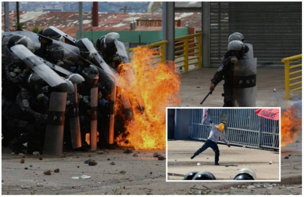 Con bombas molotov y gases lacrimógenos, el MEU y Policías se enfrentaron nuevamente frente a la entrada de la máxima casa de estudios de Honduras.