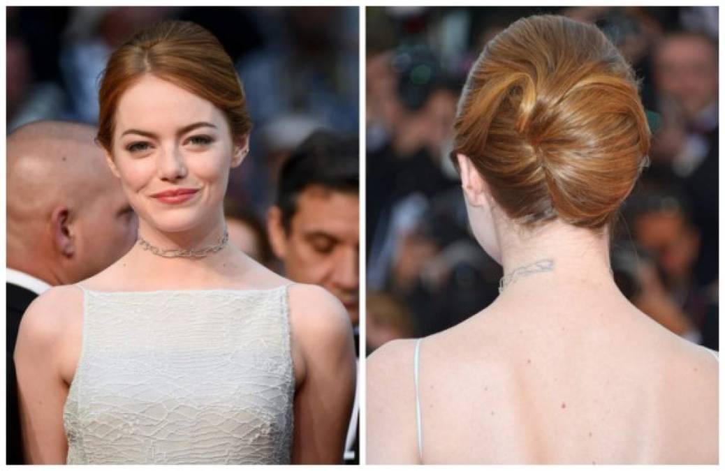 Emma Stone apuesta por un look natural en tonos neutros y piel mate, en un peinado recogido de estilo simple y sofisticado.