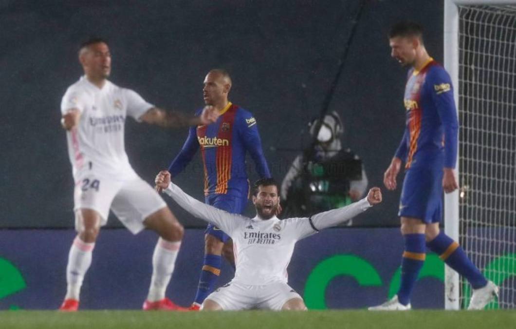 Nacho Fernández y Mariano Díaz celebrando de manera eufórica la victoria madridista.