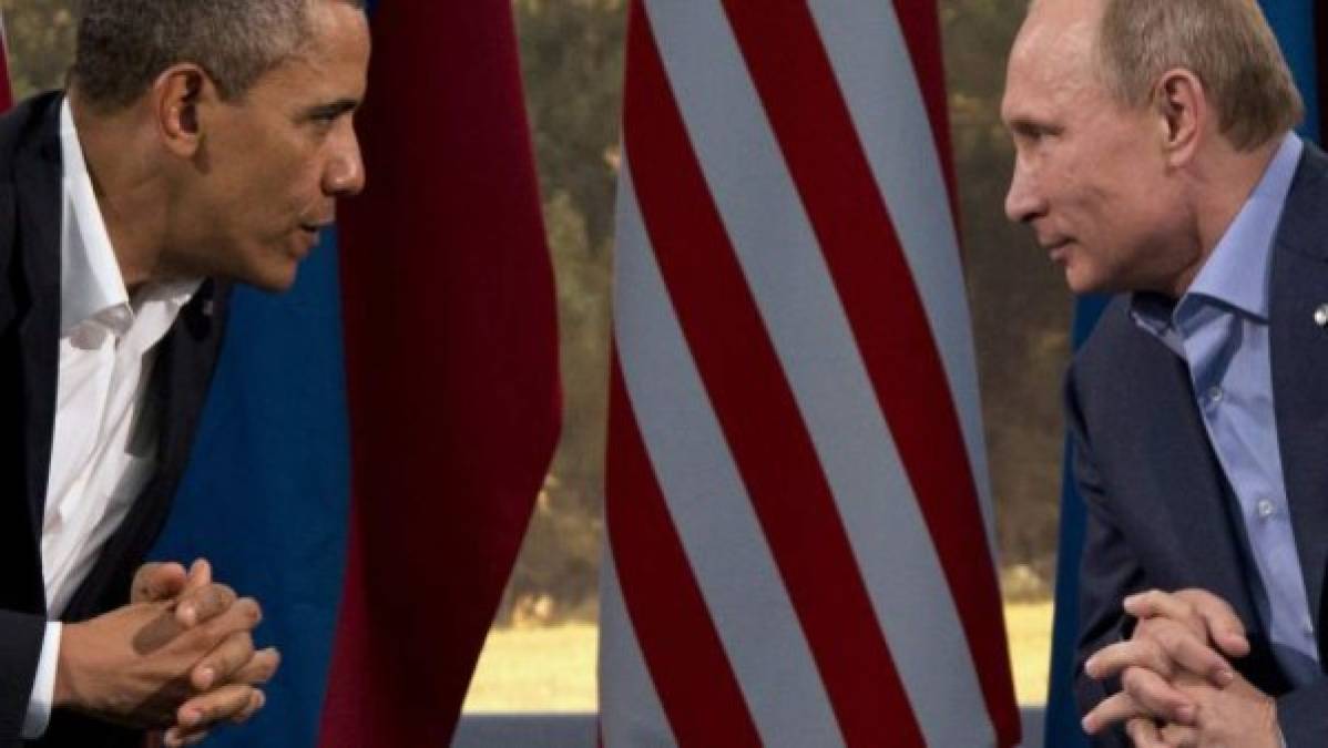 Barack Obama y Vladimir Putin durante una cumbre en Irlanda. (EFE)