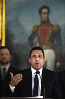 Venezuelan Foreign Minister Samuel Moncada speaks during a press conference in Caracas on July 18, 2017.US President Donald Trump threatened Venezuela with swift 'economic actions' on Monday if its leader pushes on with an unpopular bid to change his country's constitution amid mounting condemnation. / AFP PHOTO / JUAN BARRETO / The erroneous mention[s] appearing in the metadata of this photo by JUAN BARRETO has been modified in AFP systems in the following manner: [Venezuelan Foreign Minister Samuel Moncada ] instead of [Venezuelan Foreign MinisterDaniel Moncada ]. Please immediately remove the erroneous mention[s] from all your online services and delete it (them) from your servers. If you have been authorized by AFP to distribute it (them) to third parties, please ensure that the same actions are carried out by them. Failure to promptly comply with these instructions will entail liability on your part for any continued or post notification usage. Therefore we thank you very much for all your attention and prompt action. We are sorry for the inconvenience this notification may cause and remain at your disposal for any further information you may require.