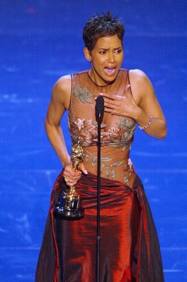 HOLLYWOOD, : US actress Halle Berry accepts her Oscar for Best performance by an actress in a leading role during the 74th Academy Awards at the Kodak Theatre in Hollywood 24 March 2002. AFP PHOTO TIMOTHY A. CLARY (Photo credit should read TIMOTHY A. CLARY/AFP/Getty Images)