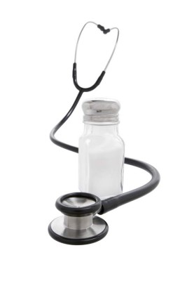 A salt shaker and a stethoscope to symbolize a link between sodium intake and good health. A diet high in sodium has been associated with hypertension, diabetes, or chronic kidney disease.