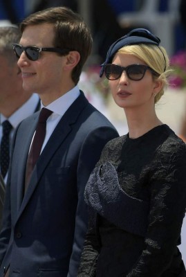 (FILES) This file photo taken on May 22, 2017 shows White House senior advisor Jared Kushner (L) and Ivanka Trump, the daughter of US President during a welcome ceremony upon the US President's arrival at Ben Gurion International Airport in Tel Aviv.Donald Trump's shock White House win transformed his soft-spoken 36-year-old son-in-law into one of the world's most powerful men, but Jared Kushner's eyebrow-raising Kremlin contacts have put that status under threat. In the halcyon first days of his administration, Trump believed there was no challenge too confounding, no conflict too intractable for his son-in-law to tackle. / AFP PHOTO / MANDEL NGAN