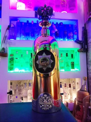 This undated handout picture, courtesy of the owner of the bar, obtained on January 3, 2017 shows the reported world's most expensive vodka bottle, valued at 1,1 million Euro displayed at the Cafe 33 in Copenhagen, Denmark as part of the bar's collection of vodka which contains 1200 bottles. Danish police on January 4, 2018 said they are investigating the theft of the vodka bottle which was featured in the political thriller 'House of Cards'. Created by the Russian car maker Russo-Baltique, the flask cap is made of white and yellow gold and contains a diamond-encrusted replica of the Russian Imperial Eagle. / AFP PHOTO / Scanpix Denmark / Brian IINGBERG / RESTRICTED TO EDITORIAL USE - MANDATORY CREDIT 'AFP PHOTO / BRIAN INGBERG' - NO MARKETING NO ADVERTISING CAMPAIGNS - DISTRIBUTED AS A SERVICE TO CLIENTS
