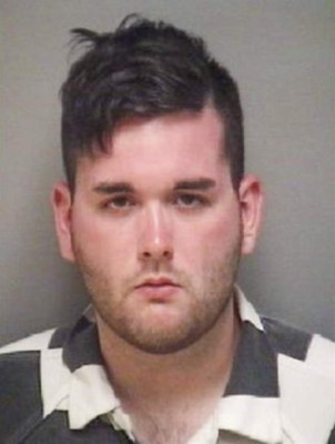 (FILES) This police booking photograph obtained August 13, 2017 courtesy of the Albemarle County Jail shows suspect James Alex Fields, Jr., who allegedly plowed a car into a crowd when a white nationalist rally erupted into deadly violence on August 12, 2017 in Charlottesville, Virginia. The suspected white supremacist who allegedly rammed his car into a crowd of protesters over the weekend was described August 14, 2017 as a quiet man who has held radical views for years. A US judge held James Fields, 20, without bond on a second-degree murder charge. He is accused of killing a 32-year-old woman Saturday when he plowed his Dodge Challenger into a crowd of counter-protestors after a violent rally by neo-Nazis and white supremacists in Charlottesville, Virginia.US Attorney General Jeff Sessions told ABC's Good Morning America program that the attack, which also injured 19 people, meets 'the definition of domestic terrorism' under US law. / AFP PHOTO / Albemarle County Jail / Albemarle County Jail