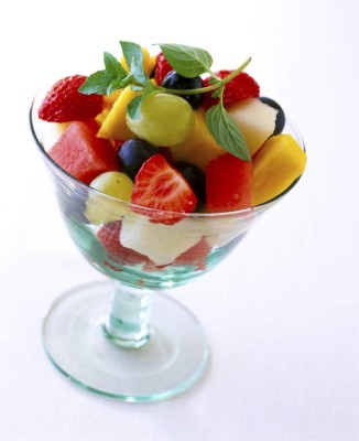 Fruit salad in glass bowl.