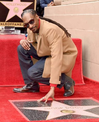 LOS ANGELES, CA - NOVEMBER 19: Snoop Dogg is honored with a star on The Hollywood Walk Of Fame on Hollywood Boulevard on November 19, 2018 in Los Angeles, California. Kevin Winter/Getty Images/AFP