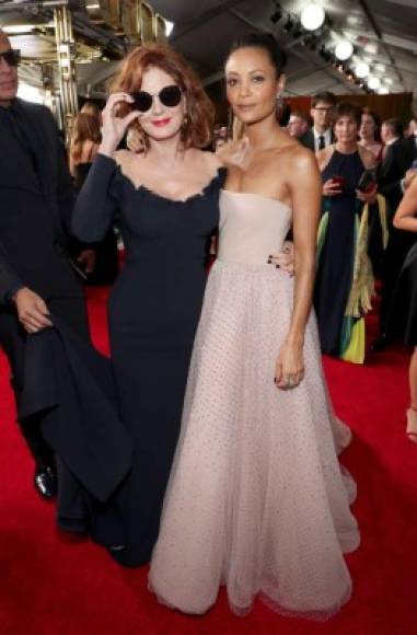 LOS ANGELES, CA - SEPTEMBER 17: Actors Susan Sarandon (L) and Thandie Newton walk the red carpet during the 69th Annual Primetime Emmy Awards at Microsoft Theater on September 17, 2017 in Los Angeles, California. Rich Polk/Getty Images for IMDb/AFP