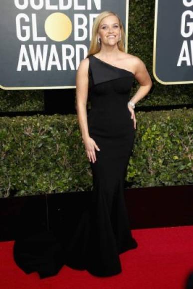 BEVERLY HILLS, CA - JANUARY 07: Reese Witherspoon attends The 75th Annual Golden Globe Awards at The Beverly Hilton Hotel on January 7, 2018 in Beverly Hills, California. Frederick M. Brown/Getty Images/AFP