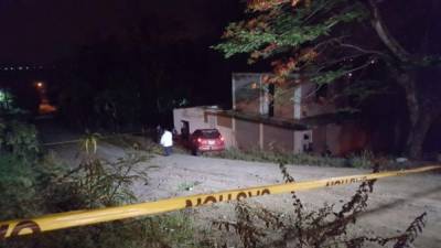 Los cuerpos fueron encontrados en un vehículo en la colonia Panting del sector de Chamelecón.