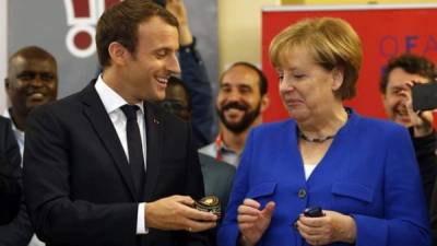 Emanuel Macron presidente de Francia y Angela Merkel canciller alemana.