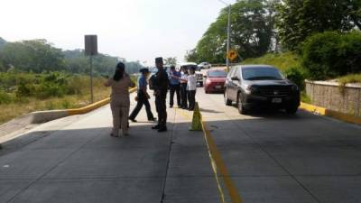 Autoridades en la escena del crimen en la ciudad de San Pedro Sula, zona norte de Honduras.