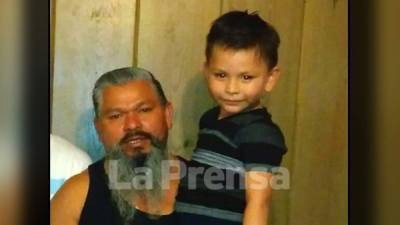 Jorge Mejía Rodriguez (49) y su hijo de cuatro años.