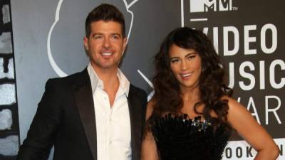 Robin Thicke en una foto de archivo junto a su exmujer, Paula Patton.