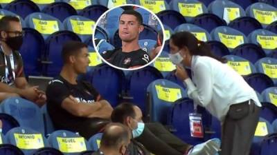 Cristiano Ronaldo estuvo sin mascarilla en la grada del estadio y fue regañado por una empleada del estadio.