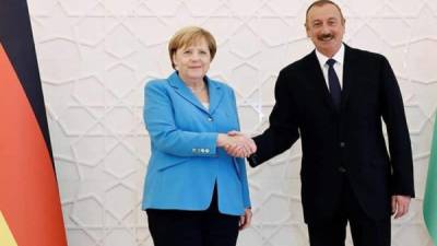 La canciller alemana Angela Merkel y el presidente de Azerbaiyán, Ilham Aliye.Foto.EFE