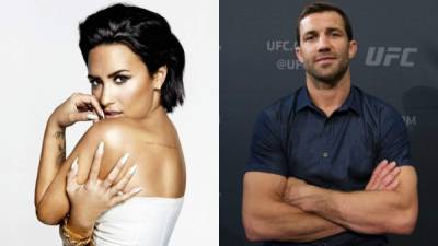 La cantante Demi Lovato y el luchador Luke Rockhold.