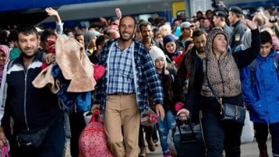 Miles de refugiados cuando arribaron a Alemania.
