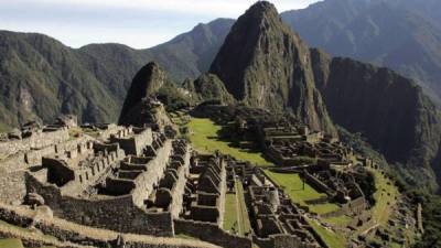 Members of a commission of authorities and experts led by the the Governor of Cusco, Jean Paul Benavente, visit the Inca citadel of Machu Picchu on June 12, 2020, assessing the new health and distancing protocols in order to reopen to the public on July 1. - According to Benavente, before the pandemic caused by the novel coronavirus Covid19, the Inca citadel had between 2,000 to 3,000 visitors a day, n high times they reached 5,000, now it will only receive 675 tourists daily. Benavente explained that the limit of visits is part of the health protocol, which includes the evaluation of social distancing, the use of masks, the restriction of certain areas. (Photo by Percy Hurtado / AFP)