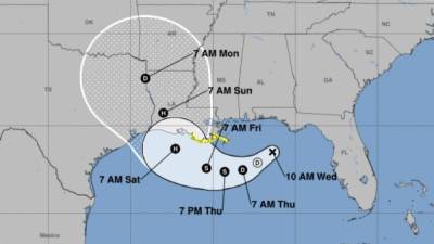 High winds blow across the Atchafalaya river in Morgan City, Louisiana ahead of Tropical Storm Barry Saturday, July 13,2019. - Tropical Storm Barry is the first tropical storm system of 2019 to make landfall in the United States and could dump up to two feet of rain along with strong winds and storm-surge flooding according to weather reports. (Photo by Seth HERALD / AFP)