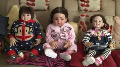 Las muñecas de la suerte de Tailandia. Foto AFP.