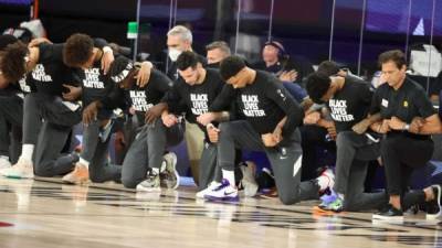 La NBA volvió a su actividad luego de varias semanas de parón debido a la pandemia del coronavirus. Foto AFP.