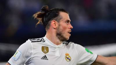 El delantero galés del Real Madrid, Gareth Bale, celebra el gol de apertura de su equipo durante la semifinal de fútbol del torneo de la Copa Mundial de Clubes de la FIFA