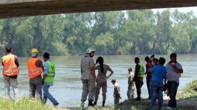Las autoridades levantaron los restos de los dos hombres en la orilla del río Ulúa en El Progreso.
