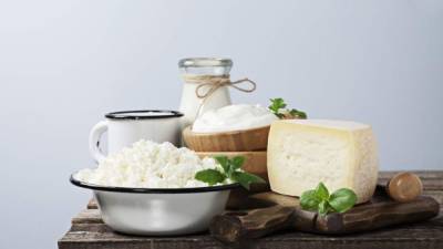 Assorted dairy products on wooden backround