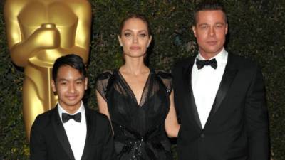 Angelina Jolie, Brad Pitt y su hijo mayor Maddox.