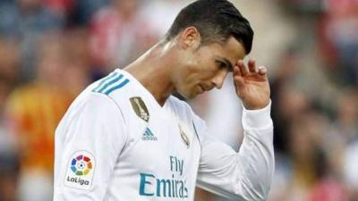 Cristiano Ronaldo es el único futbolista que ha convertido 450 goles oficiales con la camiseta del Real Madrid. Destrozó el récord de Raúl González (323 anotaciones). FOTO AFP.