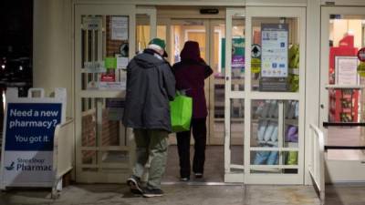 NEW YORK, NY - MARCH 24: Doctors test hospital staff with flu-like symptoms for coronavirus (COVID-19) in set-up tents to triage possible COVID-19 patients outside before they enter the main Emergency department area at St. Barnabas hospital in the Bronx on March 24, 2020 in New York City. New York City has about a third of the nations confirmed coronavirus cases, making it the center of the outbreak in the United States. Misha Friedman/Getty Images/AFP