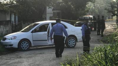 El cuerpo del taxista quedó en el interior del vehículo que conducía.