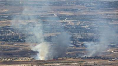 Vista del humo desde los Altos del Golán durante los combares contra la exfilial de Al Qaeda, en la frontera de Israel. EFE
