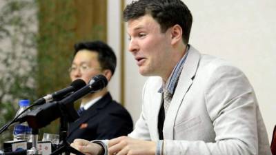 Otto Warmbier, foto tomada el 29 de febrero de 2016 y publicado por la Agencia Central de Noticias de Corea del Norte (KCNA). AFP