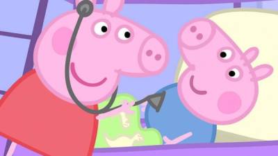In this April 27, 2018 photo, hand cranked fans with Peppa Pig theme are seen during the Global Mobile Internet Conference (GMIC) in Beijing, China. The cherubic British cartoon character, Peppa Pig, has become an unlikely target of China's censors as online fans use her porcine likeness in sardonic memes and 'gangster' catchphrases. (AP Photo/Ng Han Guan)