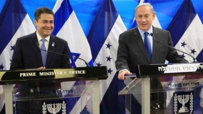 Fotografía de archivo del presidente de Honduras, Juan Orlando Hernández, y el primer ministro de Israel Benjamín Netanyahu.